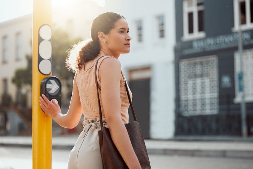 - A person standing on a street corner