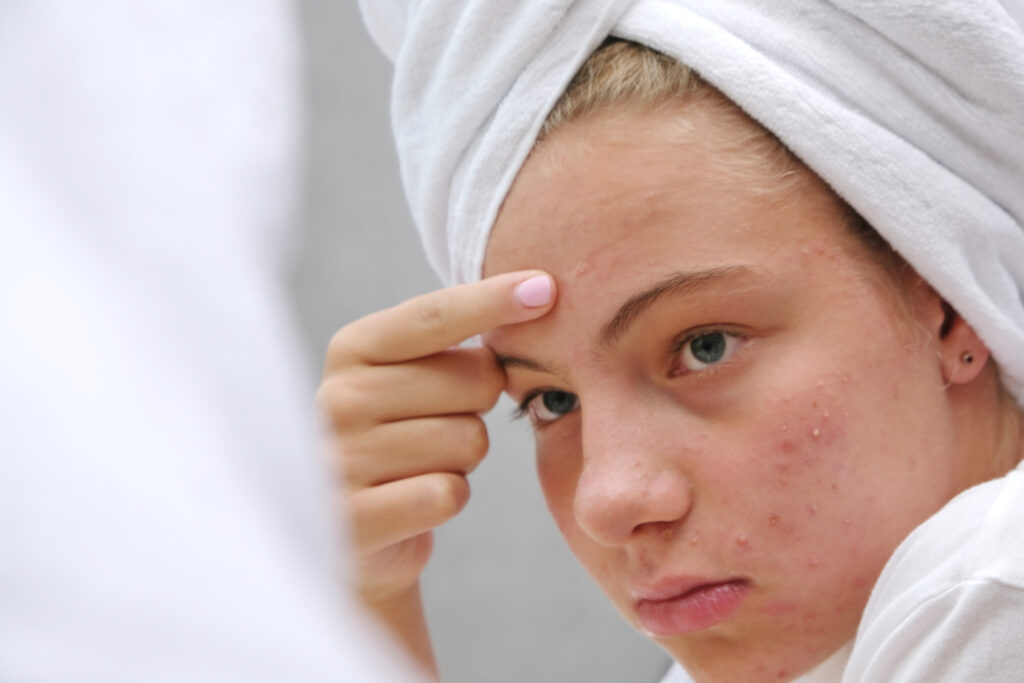 A person with a towel on their head